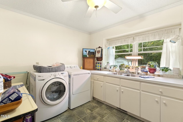 6517 Whitted Rd, Fuquay Varina, NC 27526 - laundry area featuring ornamental molding, separate washer and dryer, ceiling fan, cabinet space, and a textured ceiling