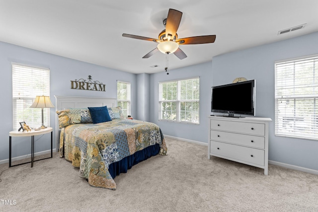 2950 Settle In Ln, Raleigh, NC 27614 - carpeted bedroom with baseboards and a ceiling fan