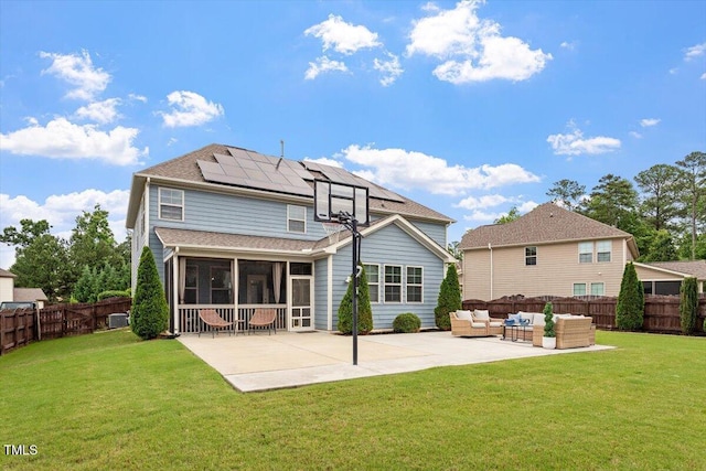 2333 Lantern Walk Ln, Wake Forest, NC 27587 - rear view of property with outdoor lounge area, roof mounted solar panels, a patio, and a sunroom