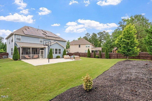 2333 Lantern Walk Ln, Wake Forest, NC 27587 - back of property with an outdoor hangout area, a sunroom, a patio area, and roof mounted solar panels