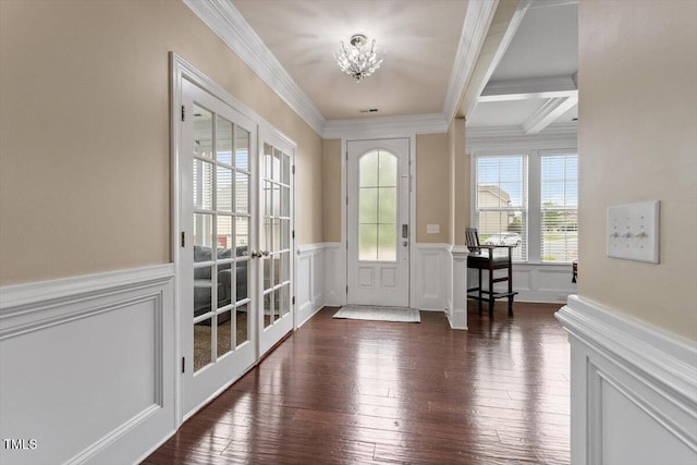 2333 Lantern Walk Ln, Wake Forest, NC 27587 - entrance foyer with french doors, crown molding, a chandelier, a decorative wall, and wainscoting