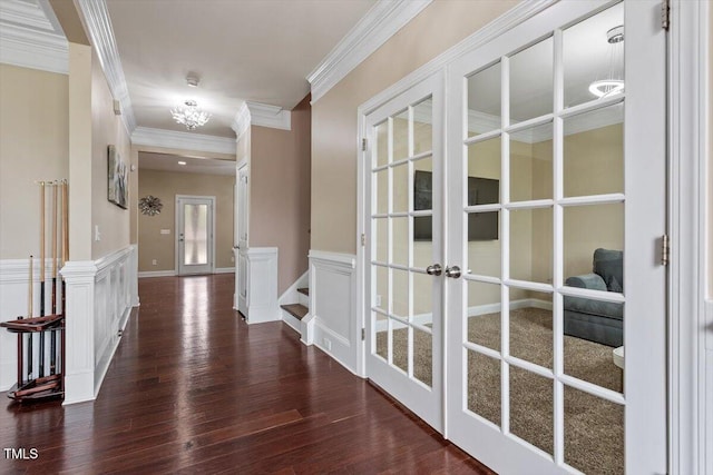2333 Lantern Walk Ln, Wake Forest, NC 27587 - corridor with ornamental molding, french doors, dark wood-style floors, and a chandelier