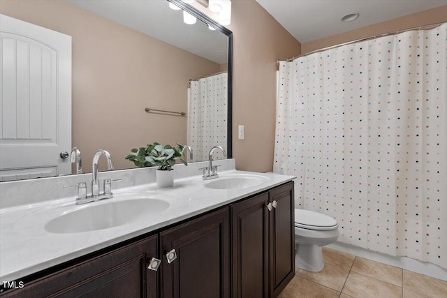 2333 Lantern Walk Ln, Wake Forest, NC 27587 - full bath with double vanity, tile patterned floors, toilet, and a shower with shower curtain