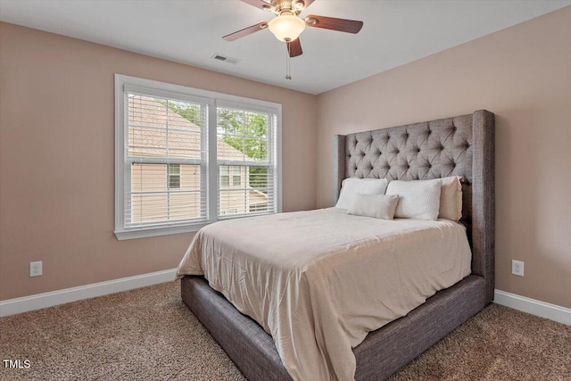 2333 Lantern Walk Ln, Wake Forest, NC 27587 - carpeted bedroom featuring baseboards and a ceiling fan