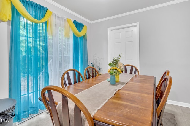 144 Shawnee Dr, Louisburg, NC 27549 - tiled dining area with ornamental molding and baseboards