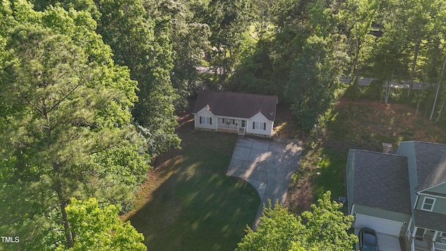 144 Shawnee Dr, Louisburg, NC 27549 - view of subject property featuring a forest