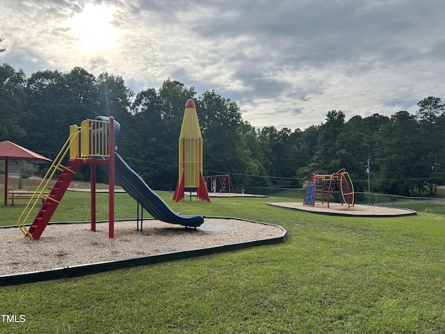 144 Shawnee Dr, Louisburg, NC 27549 - community playground with a lawn and a forest view