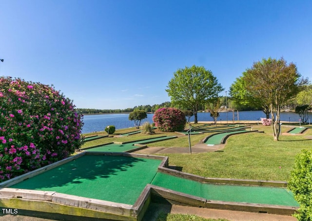 144 Shawnee Dr, Louisburg, NC 27549 - view of community with a putting green, a water view, and a yard