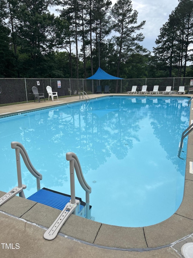 144 Shawnee Dr, Louisburg, NC 27549 - community pool featuring view of scattered trees