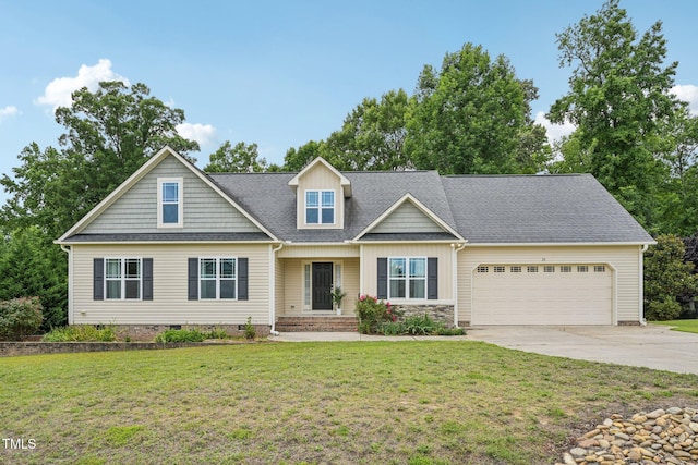 33 Bluestone Dr, Smithfield, NC 27577 - craftsman-style house featuring a garage, driveway, a front yard, and a shingled roof