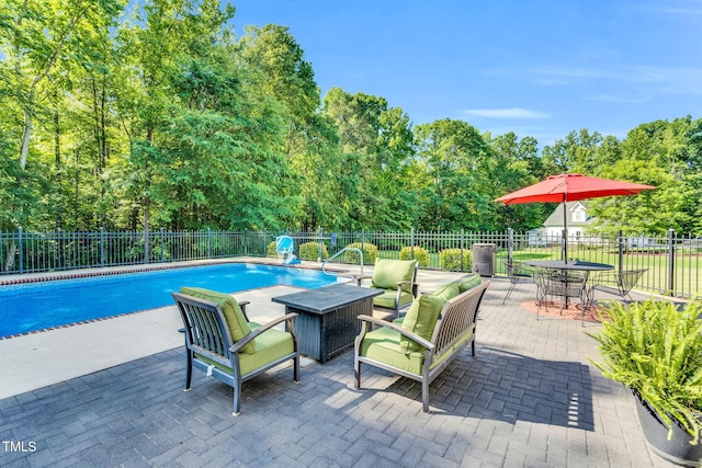 227 Paraggi Ct, Clayton, NC 27527 - view of pool featuring a patio and view of scattered trees