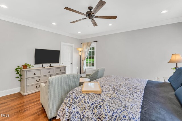 227 Paraggi Ct, Clayton, NC 27527 - bedroom featuring wood finished floors, crown molding, recessed lighting, baseboards, and a ceiling fan