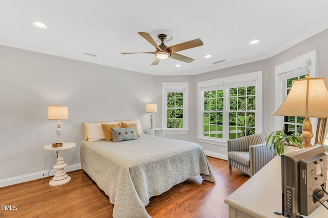 227 Paraggi Ct, Clayton, NC 27527 - bedroom with ornamental molding, wood finished floors, recessed lighting, baseboards, and a ceiling fan