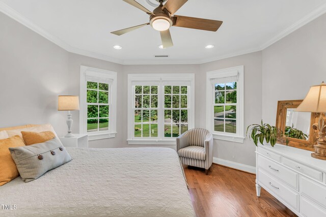 227 Paraggi Ct, Clayton, NC 27527 - bedroom with wood finished floors, baseboards, ornamental molding, ceiling fan, and recessed lighting