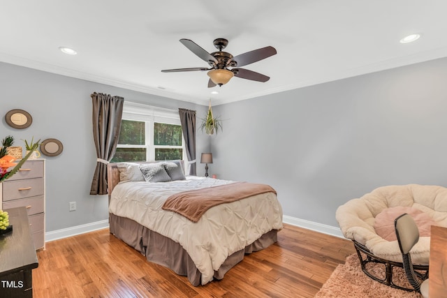 227 Paraggi Ct, Clayton, NC 27527 - bedroom featuring baseboards, light wood-style floors, ornamental molding, recessed lighting, and a ceiling fan