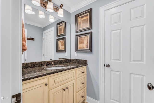 227 Paraggi Ct, Clayton, NC 27527 - bathroom with vanity, crown molding, and baseboards