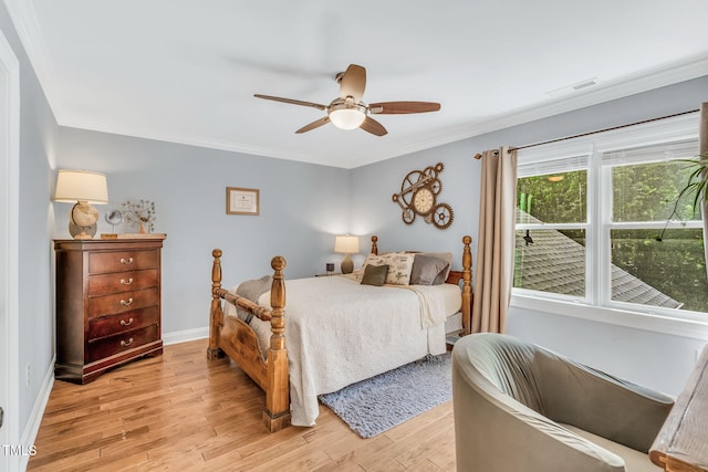 227 Paraggi Ct, Clayton, NC 27527 - bedroom with light wood-style flooring, ornamental molding, baseboards, and ceiling fan