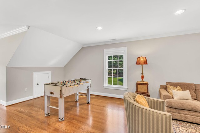 227 Paraggi Ct, Clayton, NC 27527 - playroom with light wood-type flooring, recessed lighting, baseboards, crown molding, and vaulted ceiling