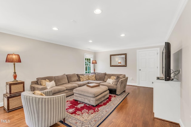 227 Paraggi Ct, Clayton, NC 27527 - living room featuring crown molding, wood finished floors, baseboards, and recessed lighting