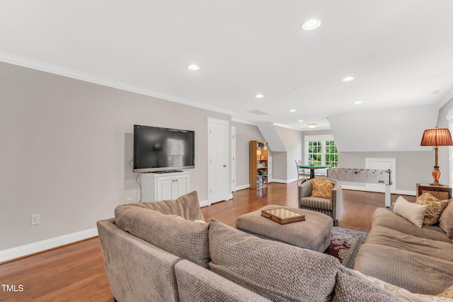 227 Paraggi Ct, Clayton, NC 27527 - living room featuring baseboards, ornamental molding, wood finished floors, and recessed lighting