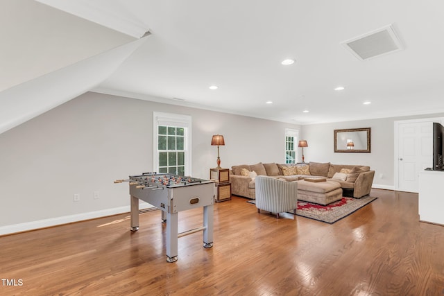 227 Paraggi Ct, Clayton, NC 27527 - rec room with wood finished floors, baseboards, recessed lighting, and crown molding