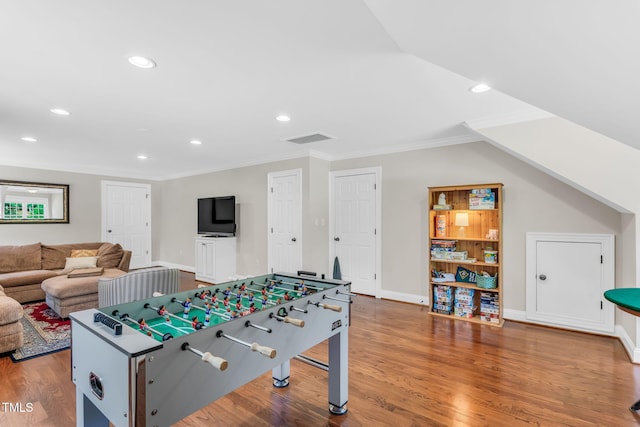 227 Paraggi Ct, Clayton, NC 27527 - recreation room with recessed lighting, wood finished floors, baseboards, and ornamental molding