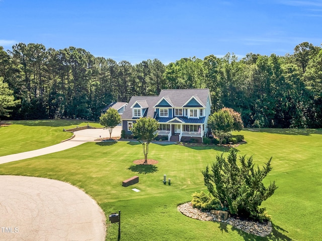 227 Paraggi Ct, Clayton, NC 27527 - view of front of property featuring covered porch and a front yard