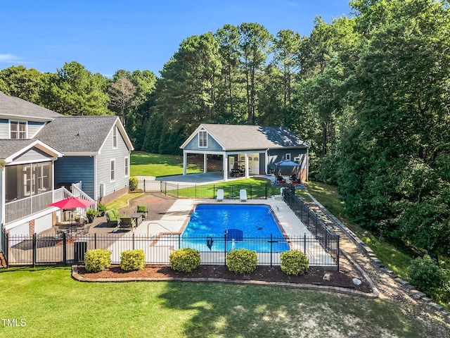 227 Paraggi Ct, Clayton, NC 27527 - view of swimming pool with a patio and an outbuilding