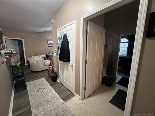 621 Marshtree Ln Unit 303, Fayetteville, NC 28314 - hall featuring light wood-style floors and baseboards