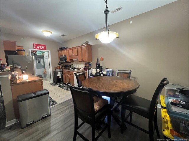 621 Marshtree Ln Unit 303, Fayetteville, NC 28314 - dining space featuring light wood-type flooring
