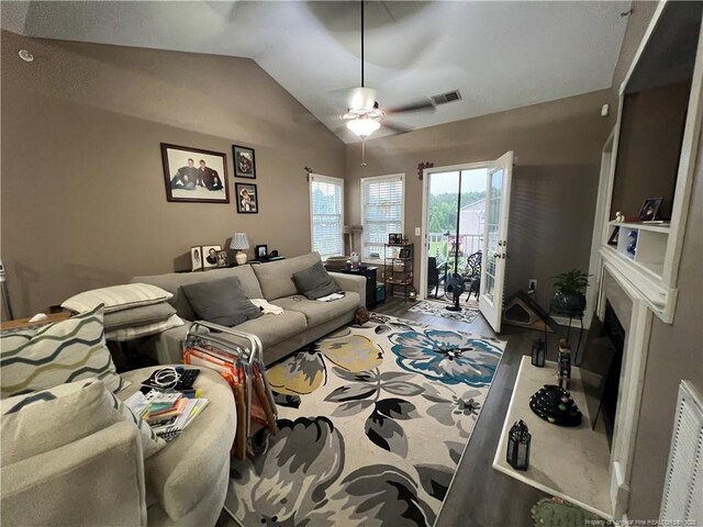 621 Marshtree Ln Unit 303, Fayetteville, NC 28314 - living area featuring ceiling fan, lofted ceiling, and wood finished floors