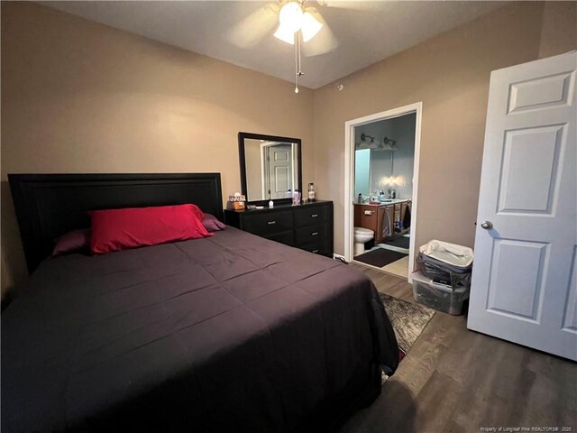 621 Marshtree Ln Unit 303, Fayetteville, NC 28314 - bedroom with wood finished floors, connected bathroom, and ceiling fan