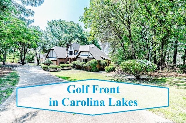 259 Golf Dr, Sanford, NC 27332 - community / neighborhood sign featuring a yard