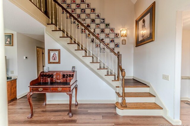 259 Golf Dr, Sanford, NC 27332 - stairs with wood finished floors and baseboards