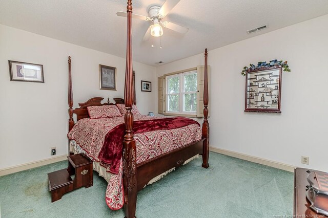 259 Golf Dr, Sanford, NC 27332 - carpeted bedroom featuring ceiling fan and baseboards