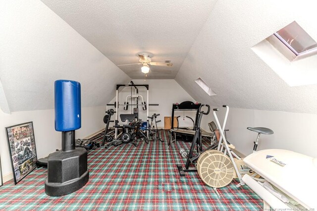 259 Golf Dr, Sanford, NC 27332 - exercise room featuring carpet, a skylight, a textured ceiling, vaulted ceiling, and ceiling fan