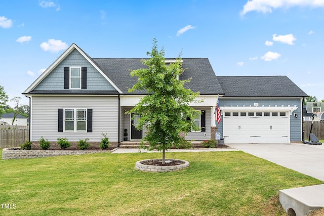 137 Clydes Point Way, Wendell, NC 27591 - traditional-style home with concrete driveway, a garage, and roof with shingles