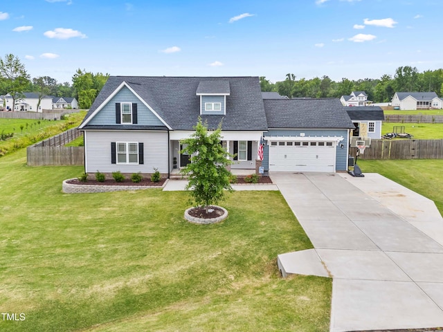137 Clydes Point Way, Wendell, NC 27591 - traditional home featuring driveway, an attached garage, a shingled roof, and a residential view