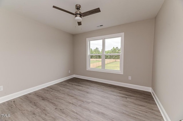 117 Knight Rd, Broadway, NC 27505 - unfurnished room featuring wood finished floors, baseboards, and ceiling fan