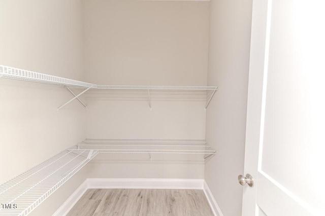 117 Knight Rd, Broadway, NC 27505 - spacious closet featuring wood finished floors