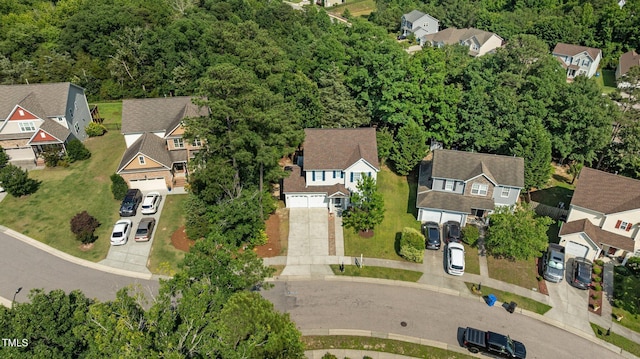 648 Long Melford Dr, Rolesville, NC 27571 - aerial perspective of suburban area featuring a forest