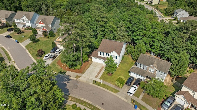 648 Long Melford Dr, Rolesville, NC 27571 - aerial perspective of suburban area featuring a heavily wooded area