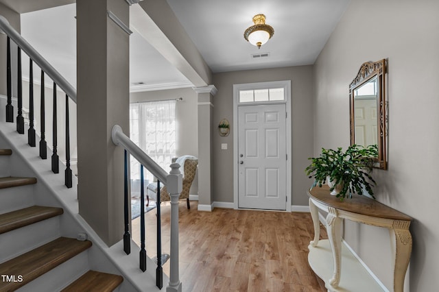 648 Long Melford Dr, Rolesville, NC 27571 - entrance foyer with light wood-style floors, baseboards, and stairway