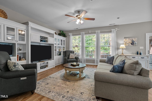 648 Long Melford Dr, Rolesville, NC 27571 - living area featuring ceiling fan and light wood-type flooring