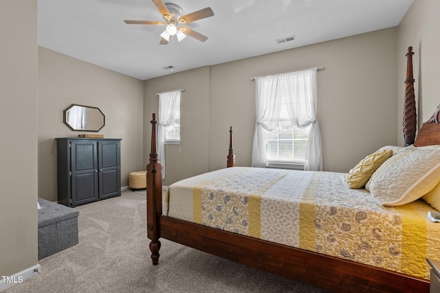 648 Long Melford Dr, Rolesville, NC 27571 - bedroom with multiple windows, light carpet, and a ceiling fan