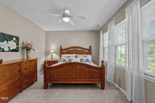648 Long Melford Dr, Rolesville, NC 27571 - bedroom featuring light colored carpet, ceiling fan, and baseboards