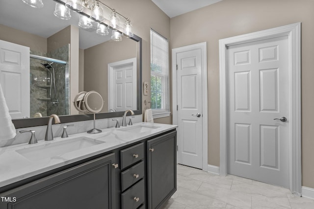 648 Long Melford Dr, Rolesville, NC 27571 - full bath featuring double vanity, a stall shower, baseboards, and marble finish floors