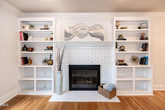 3317 E Jameson Rd, Raleigh, NC 27604 - detailed view of wood finished floors, a brick fireplace, and ornamental molding