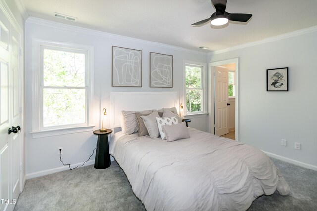 3317 E Jameson Rd, Raleigh, NC 27604 - bedroom featuring crown molding, multiple windows, light colored carpet, and ceiling fan