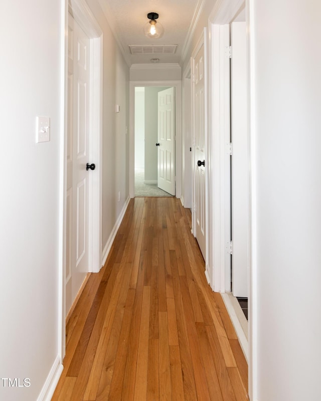 3317 E Jameson Rd, Raleigh, NC 27604 - hall featuring crown molding and light wood-style floors
